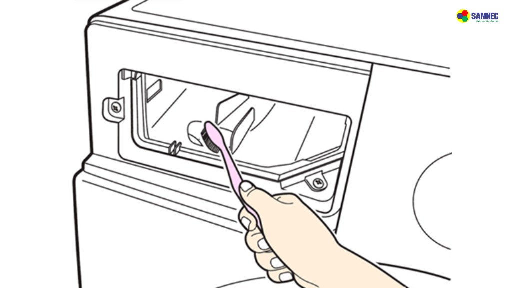 Sử dụng bàn chải đánh răng cũ để vệ sinh sạch các khe của ngăn chứa.